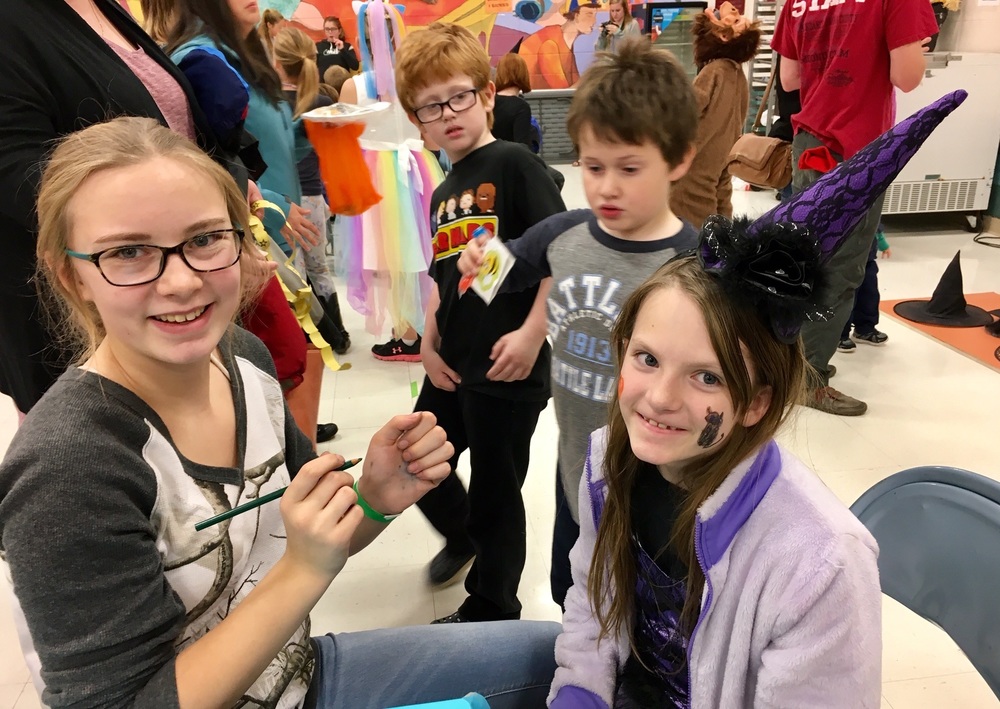 Face painting at the fall carnival. 